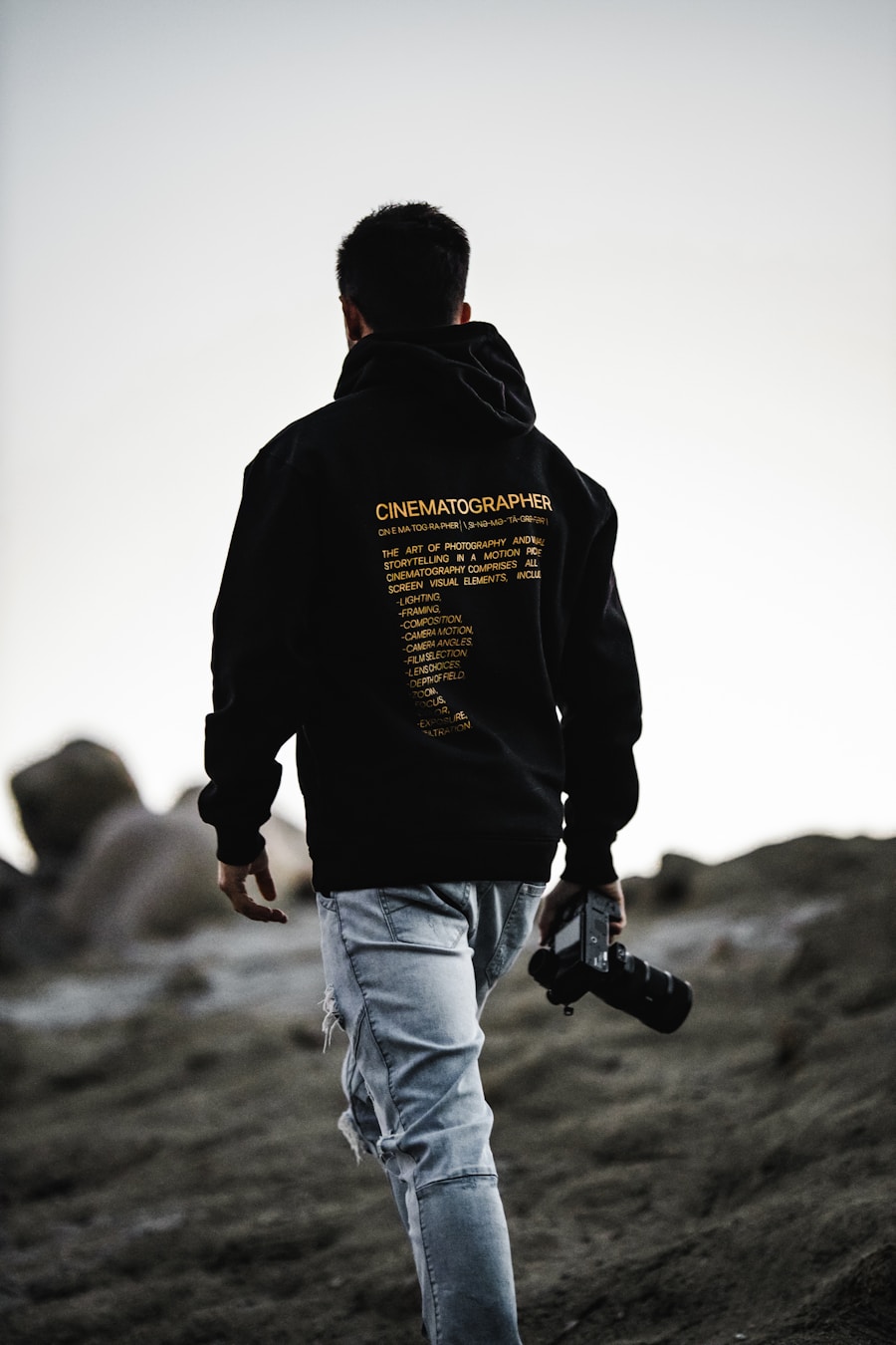 Black photographer at work with a professional camera